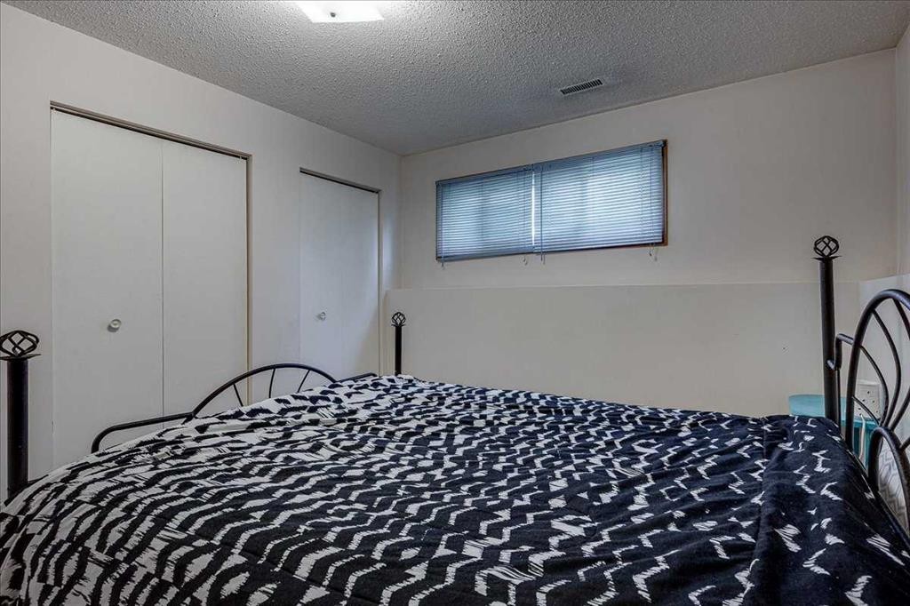 43 Oak Street, Red Deer, AB - Indoor Photo Showing Bedroom