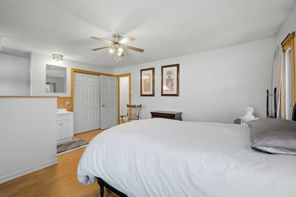 5127 50 A Avenue, Sylvan Lake, AB - Indoor Photo Showing Bedroom