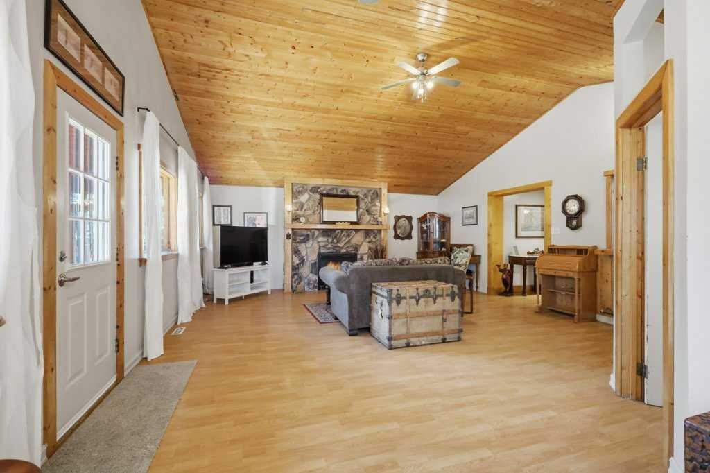 5127 50 A Avenue, Sylvan Lake, AB - Indoor With Fireplace