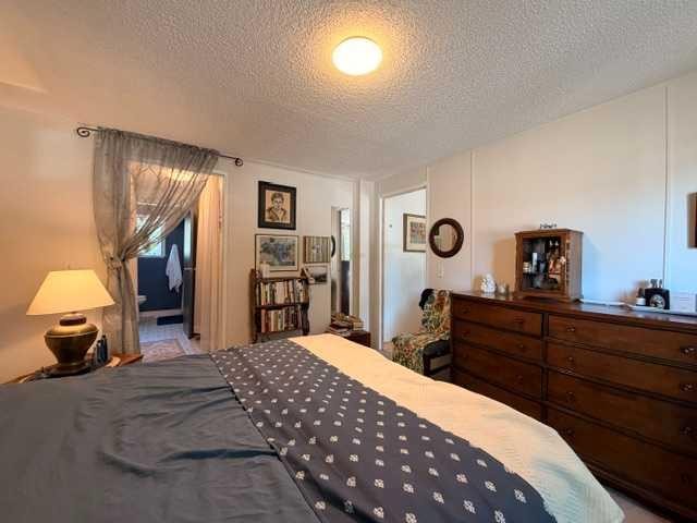 5412 49 A Avenue, Alix, AB - Indoor Photo Showing Bedroom
