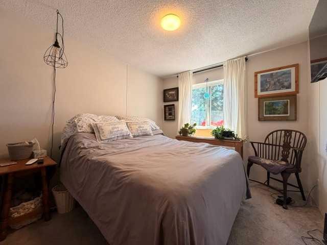 5412 49 A Avenue, Alix, AB - Indoor Photo Showing Bedroom