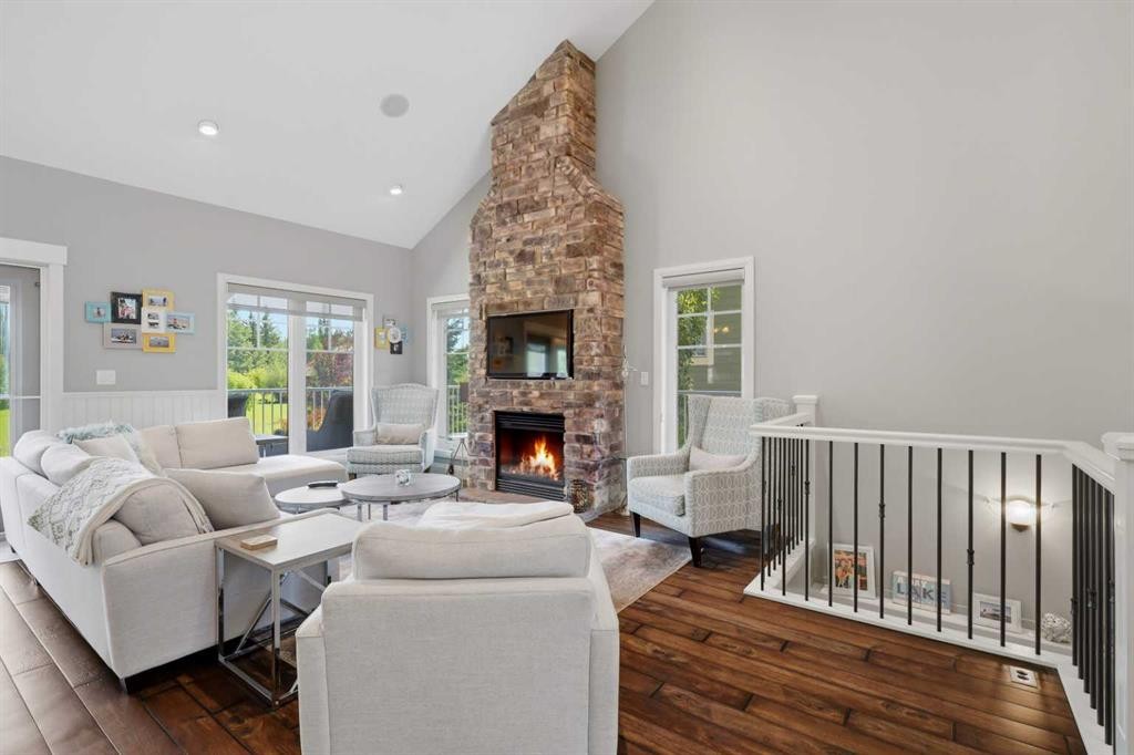447 Summer Crescent, Rural Ponoka County, AB - Indoor Photo Showing Living Room With Fireplace