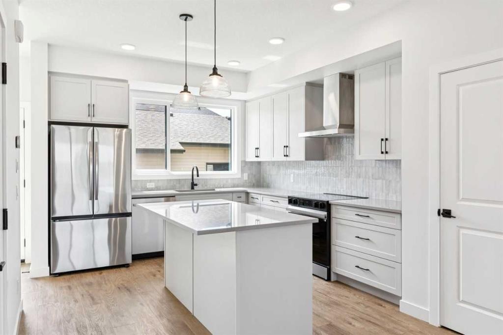 49 Silverton Glen Way Sw, Calgary, AB - Indoor Photo Showing Kitchen With Upgraded Kitchen
