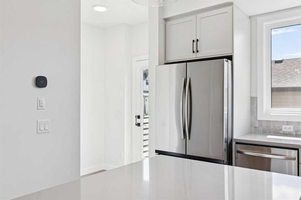 49 Silverton Glen Way Sw, Calgary, AB - Indoor Photo Showing Kitchen With Upgraded Kitchen