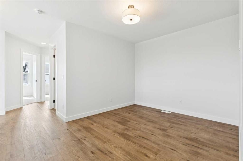 49 Silverton Glen Way Sw, Calgary, AB - Indoor Photo Showing Other Room