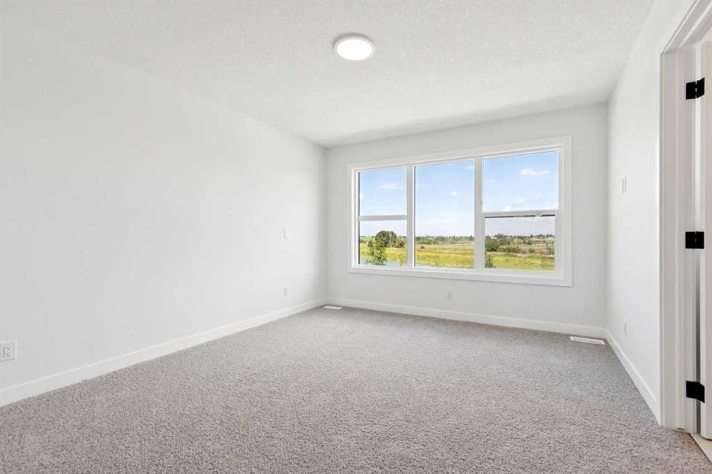 49 Silverton Glen Way Sw, Calgary, AB - Indoor Photo Showing Other Room