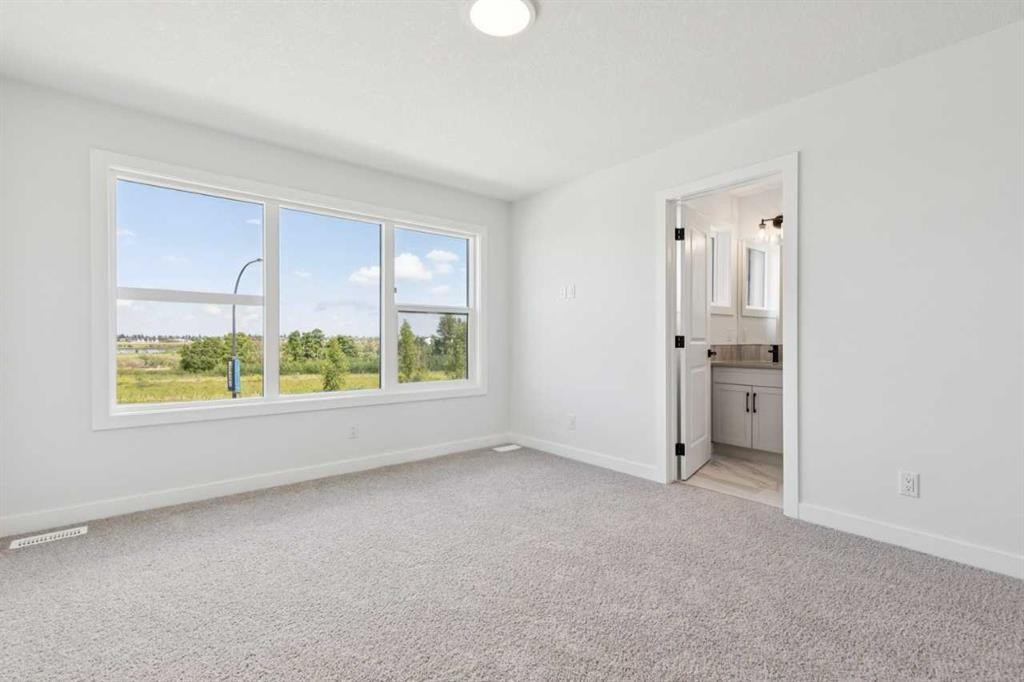 49 Silverton Glen Way Sw, Calgary, AB - Indoor Photo Showing Other Room