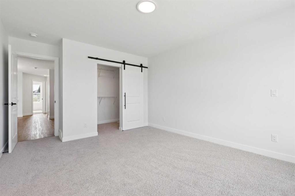 49 Silverton Glen Way Sw, Calgary, AB - Indoor Photo Showing Other Room