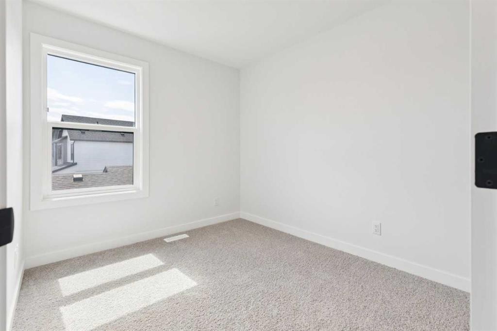 49 Silverton Glen Way Sw, Calgary, AB - Indoor Photo Showing Other Room