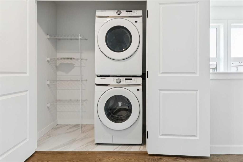 49 Silverton Glen Way Sw, Calgary, AB - Indoor Photo Showing Laundry Room