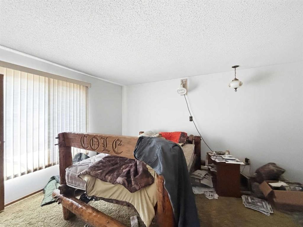 24 Brookes Crescent, Red Deer, AB - Indoor Photo Showing Bedroom