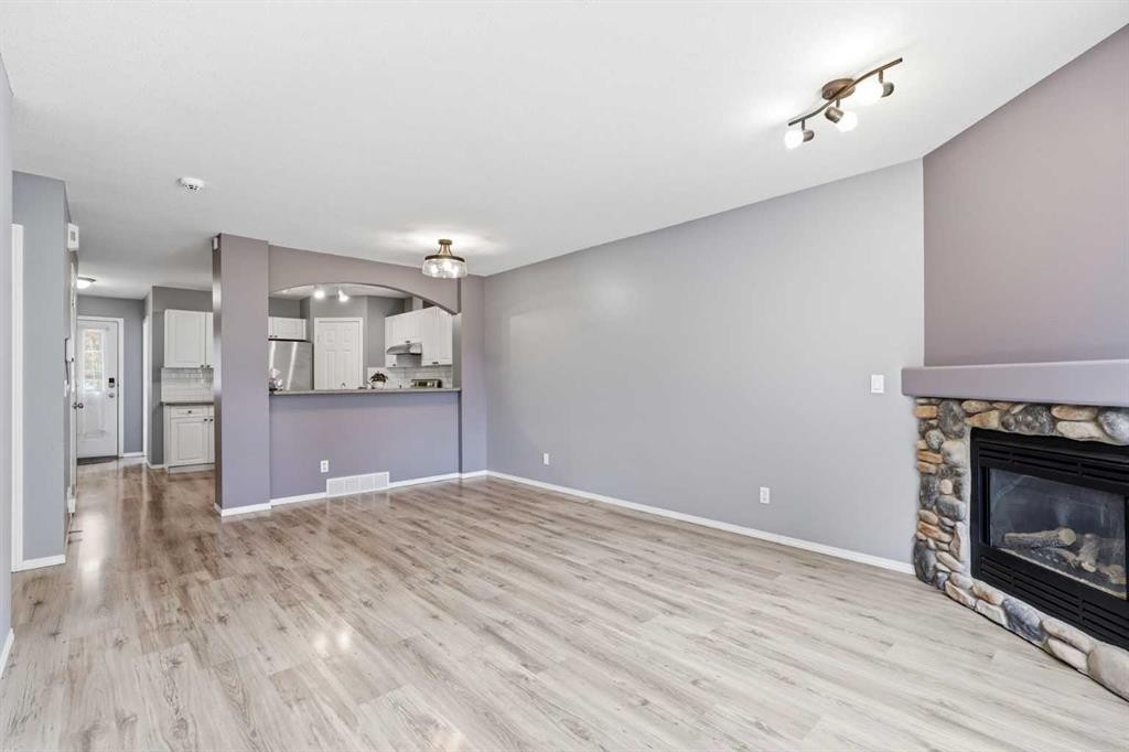 3 Janko Close, Red Deer, AB - Indoor Photo Showing Living Room With Fireplace
