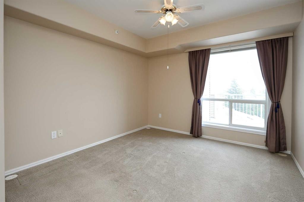 409-6118 53 Avenue, Red Deer, AB - Indoor Photo Showing Other Room