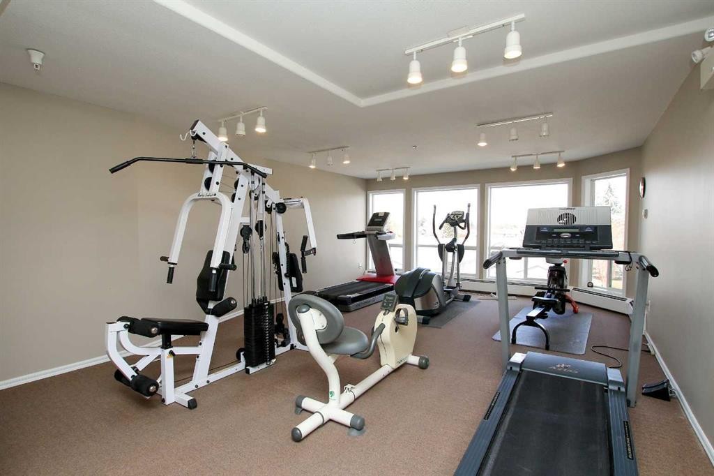 409-6118 53 Avenue, Red Deer, AB - Indoor Photo Showing Gym Room