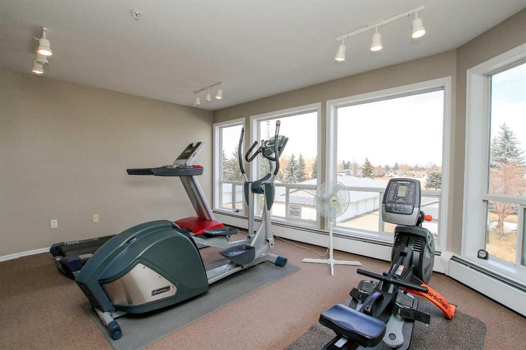 409-6118 53 Avenue, Red Deer, AB - Indoor Photo Showing Gym Room