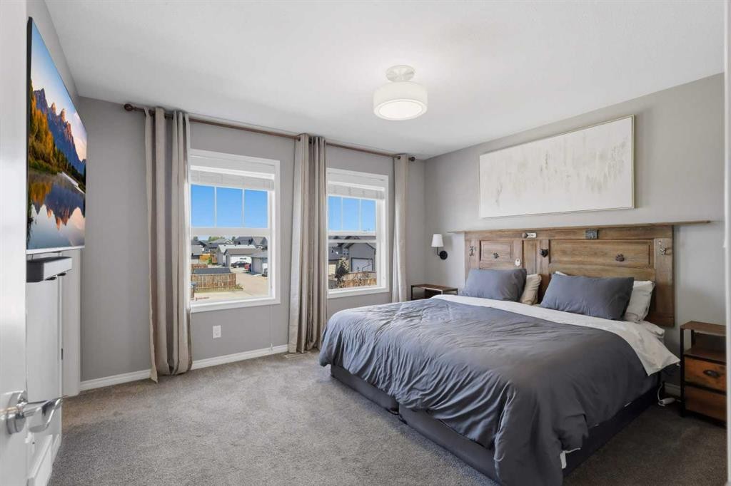 9 Hampton Crescent, Sylvan Lake, AB - Indoor Photo Showing Bedroom