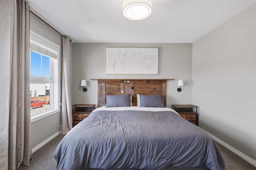 9 Hampton Crescent, Sylvan Lake, AB - Indoor Photo Showing Bedroom
