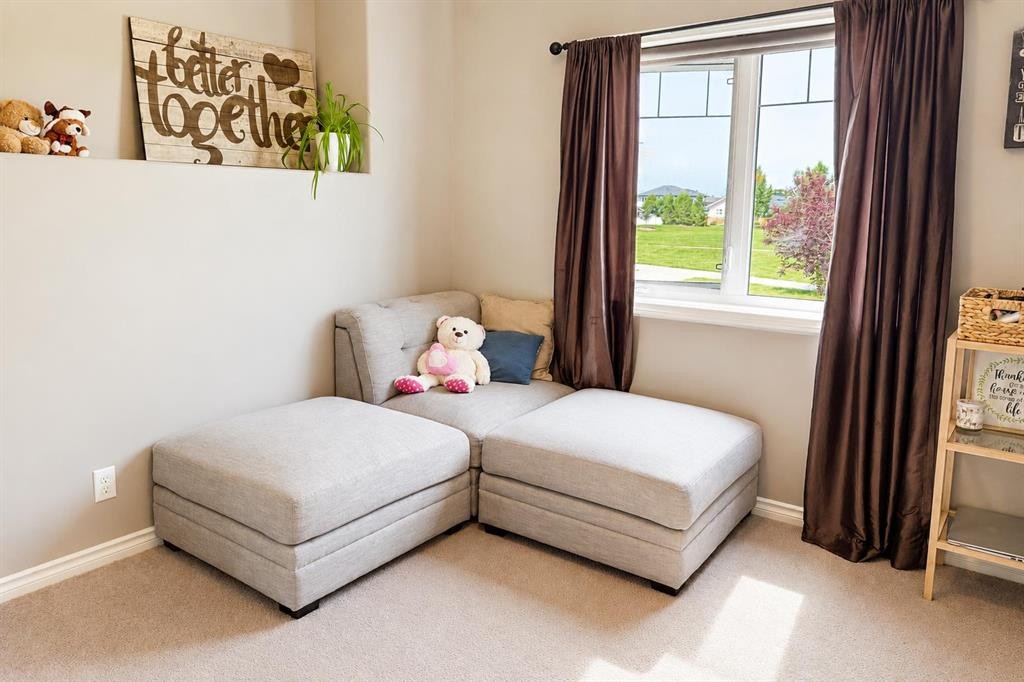 63 Hawkridge Boulevard, Penhold, AB - Indoor Photo Showing Bedroom