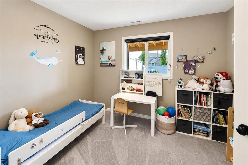 63 Hawkridge Boulevard, Penhold, AB - Indoor Photo Showing Bedroom