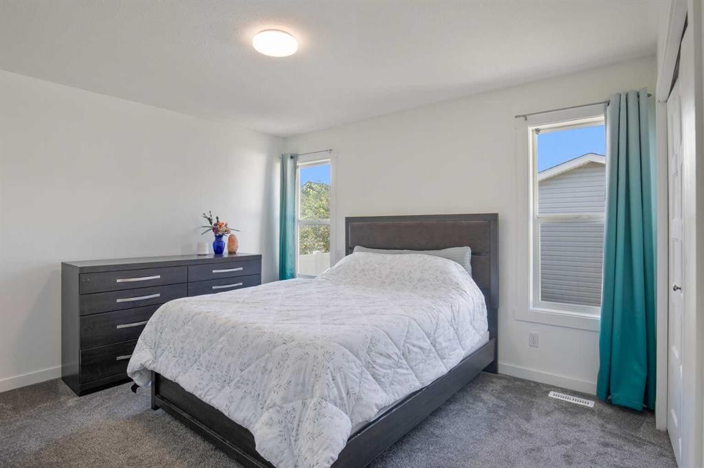 3 Taylor Drive, Lacombe, AB - Indoor Photo Showing Bedroom