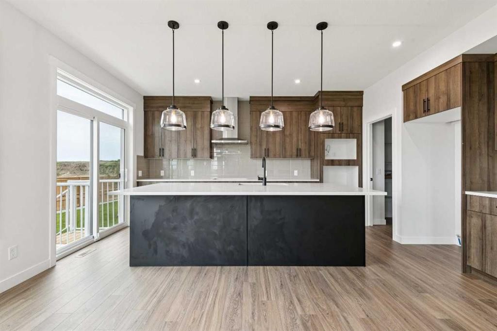 412 Bridgeport Glen, Chestermere, AB - Indoor Photo Showing Kitchen With Upgraded Kitchen