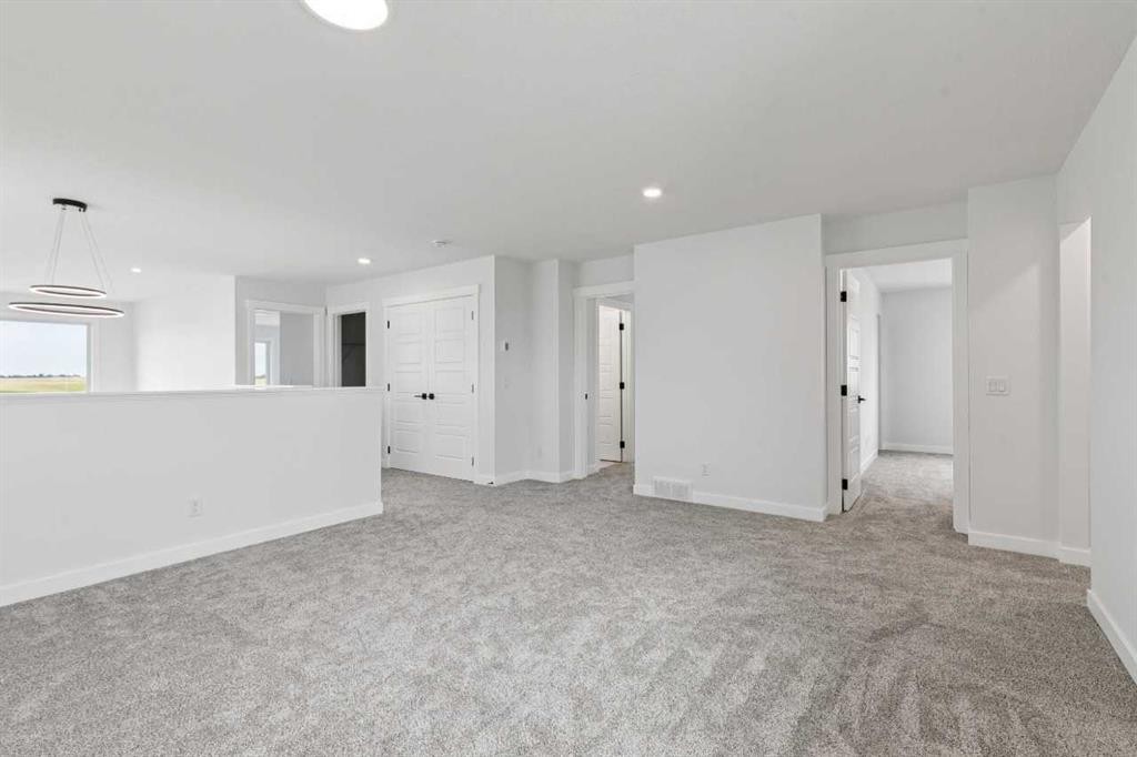 412 Bridgeport Glen, Chestermere, AB - Indoor Photo Showing Other Room