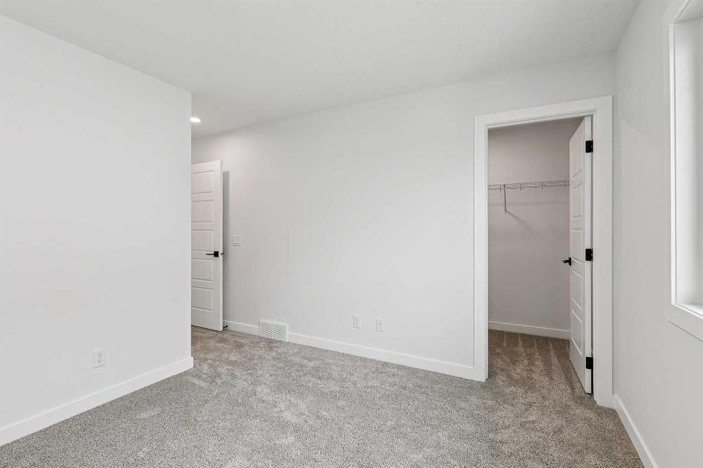 412 Bridgeport Glen, Chestermere, AB - Indoor Photo Showing Other Room