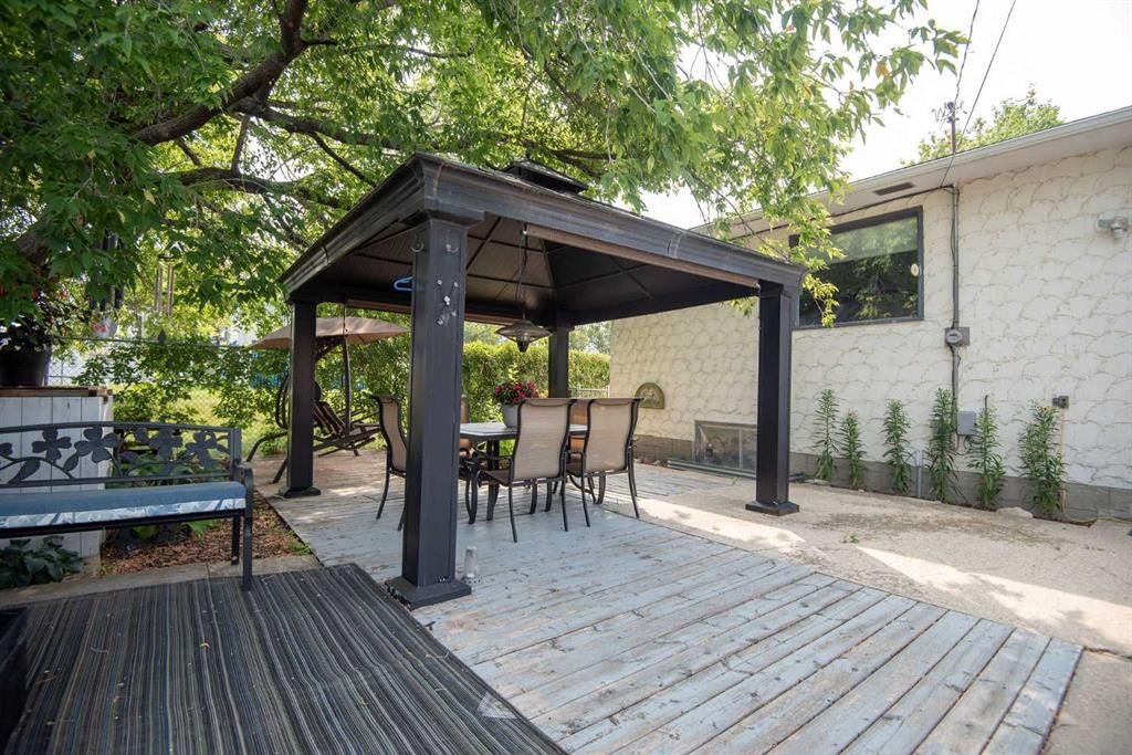 4606 51 Avenue, Bentley, AB - Outdoor With Deck Patio Veranda With Exterior