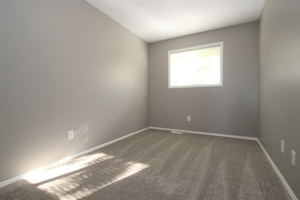 52-73 Addington Drive, Red Deer, AB - Indoor Photo Showing Other Room