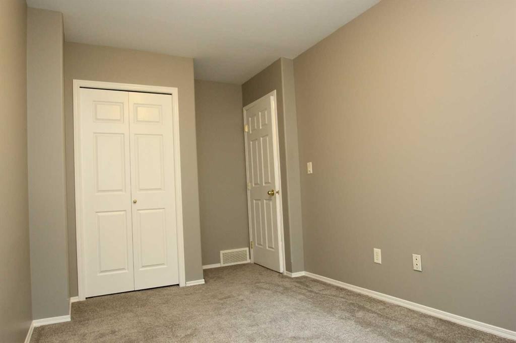 52-73 Addington Drive, Red Deer, AB - Indoor Photo Showing Other Room