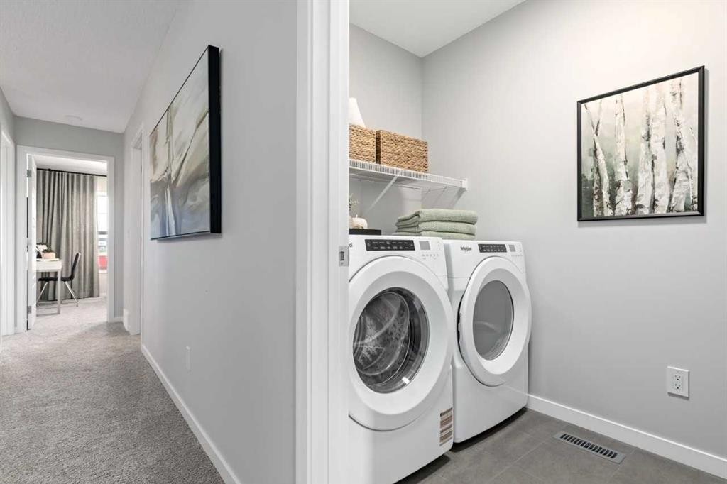 447 Chelsea Port Crossing, Chestermere, AB - Indoor Photo Showing Laundry Room