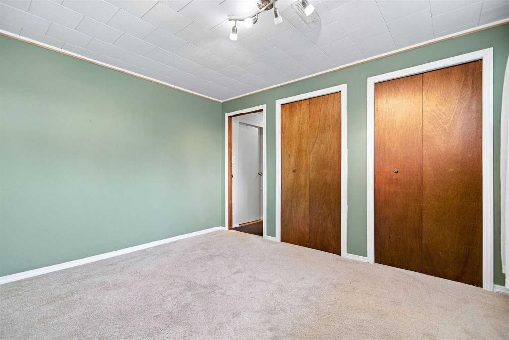 4310 54 Avenue, Olds, AB - Indoor Photo Showing Bedroom