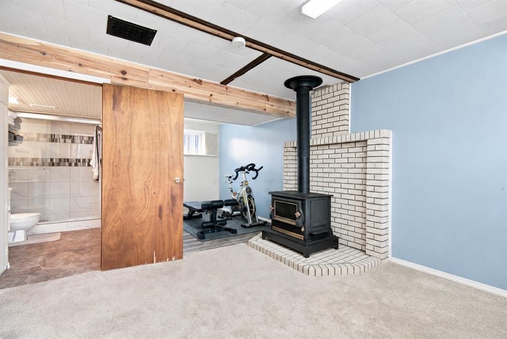 4310 54 Avenue, Olds, AB - Indoor With Fireplace