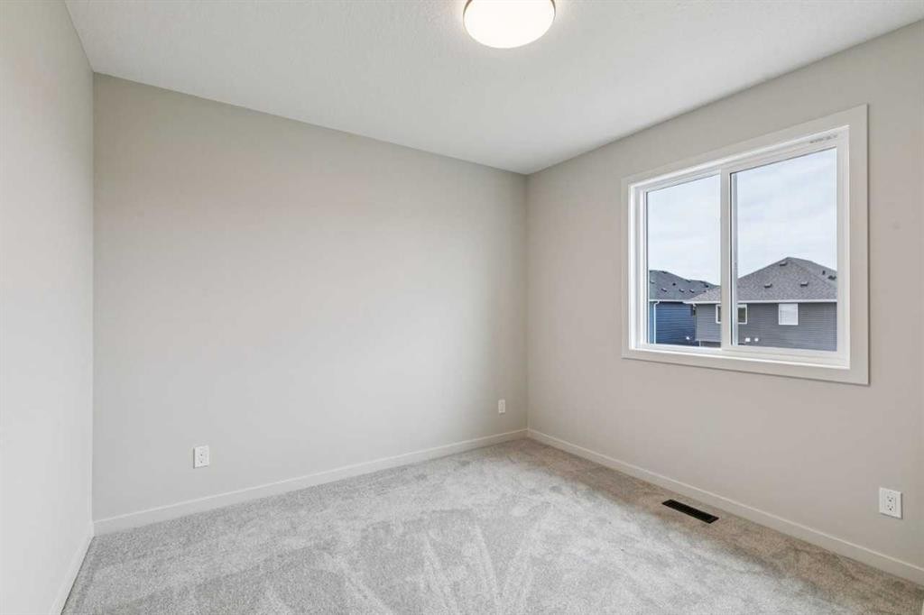 660 Clearwater Heath, Chestermere, AB - Indoor Photo Showing Other Room
