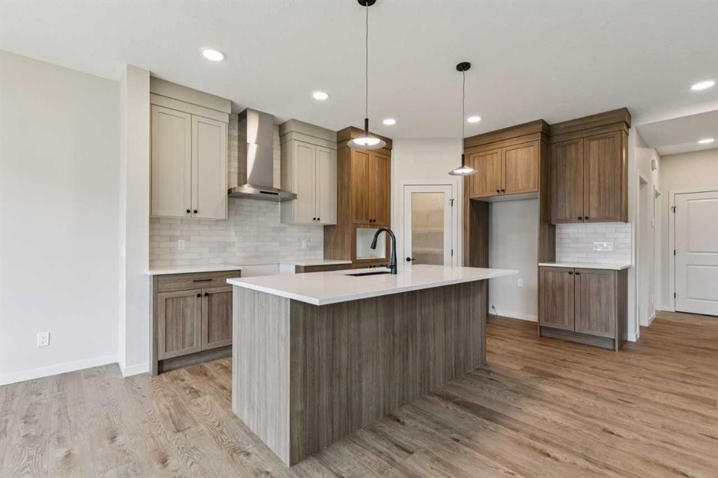 660 Clearwater Heath, Chestermere, AB - Indoor Photo Showing Kitchen With Upgraded Kitchen