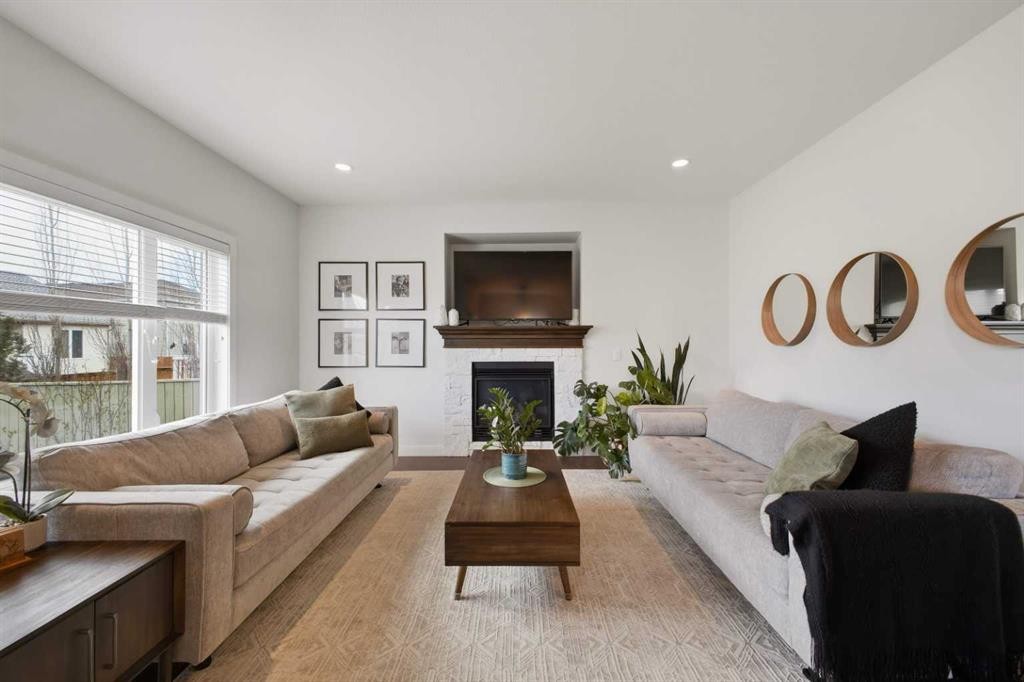 10 Viceroy Crescent, Olds, AB - Indoor Photo Showing Living Room With Fireplace