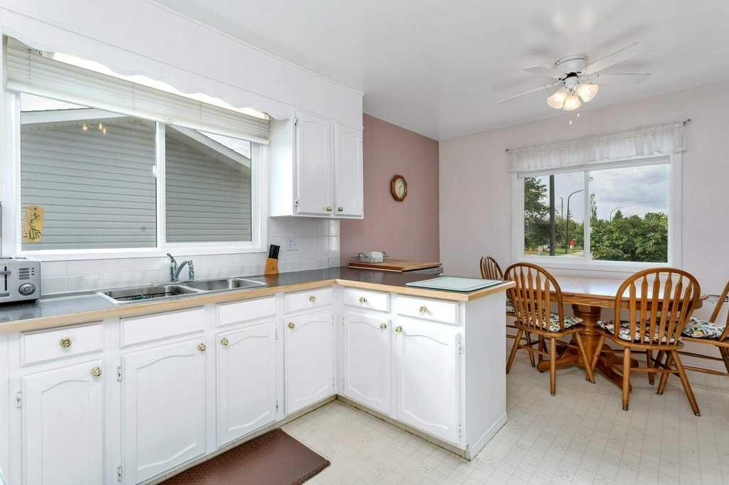 6739 59Th Avenue, Red Deer, AB - Indoor Photo Showing Kitchen With Double Sink