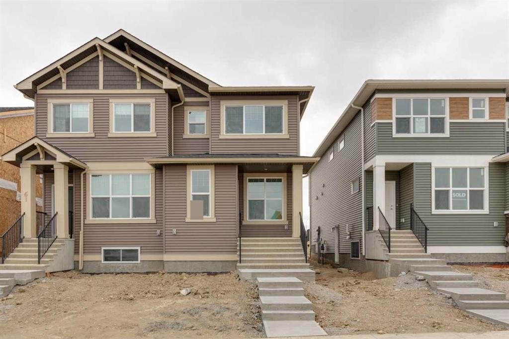 65 Aquila Terrace Nw, Calgary, AB - Outdoor With Facade