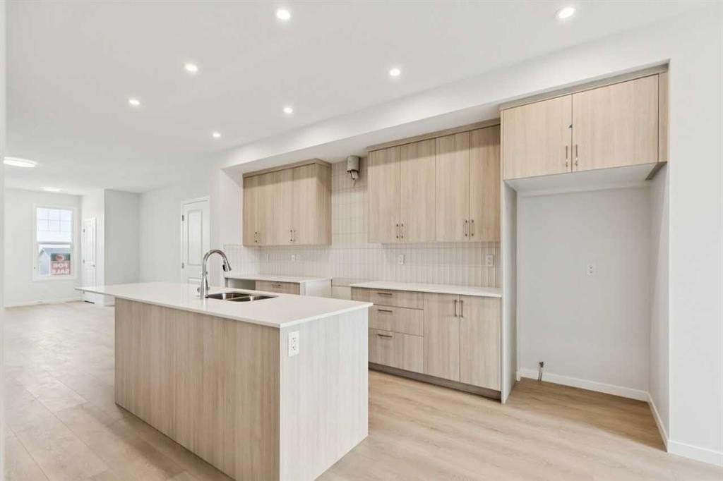 65 Aquila Terrace Nw, Calgary, AB - Indoor Photo Showing Kitchen With Double Sink