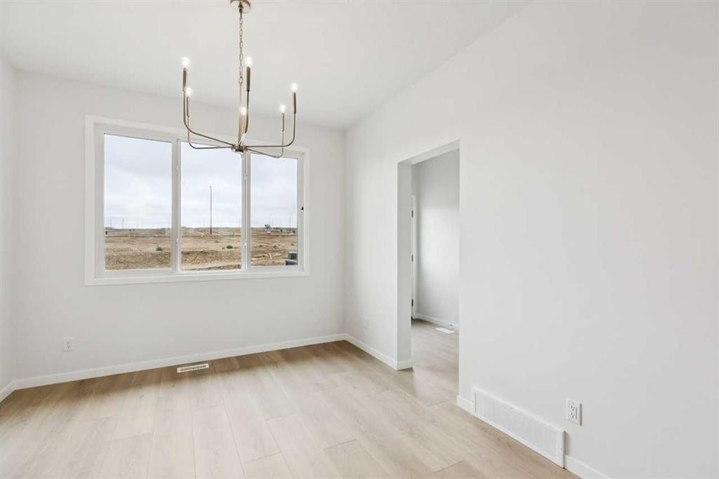 65 Aquila Terrace Nw, Calgary, AB - Indoor Photo Showing Other Room