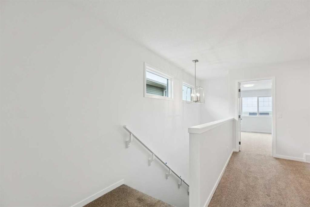 65 Aquila Terrace Nw, Calgary, AB - Indoor Photo Showing Other Room