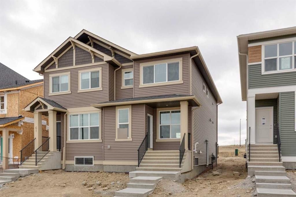 65 Aquila Terrace Nw, Calgary, AB - Outdoor With Facade