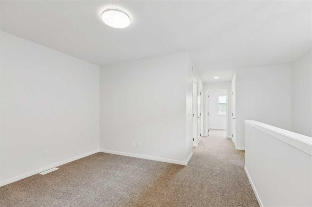 65 Aquila Terrace Nw, Calgary, AB - Indoor Photo Showing Other Room