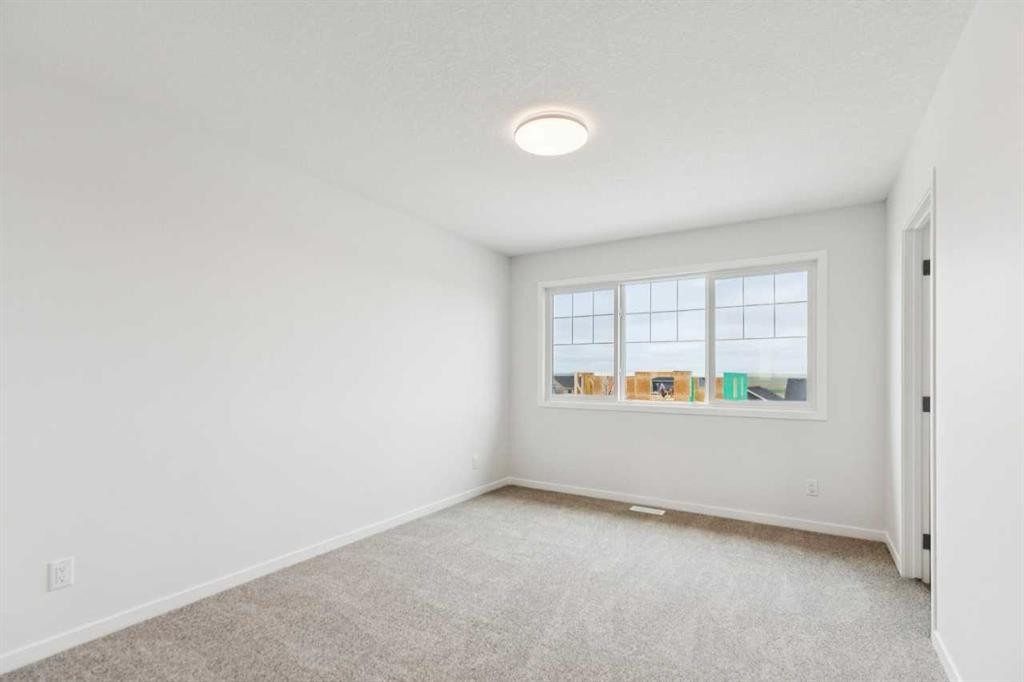 65 Aquila Terrace Nw, Calgary, AB - Indoor Photo Showing Other Room