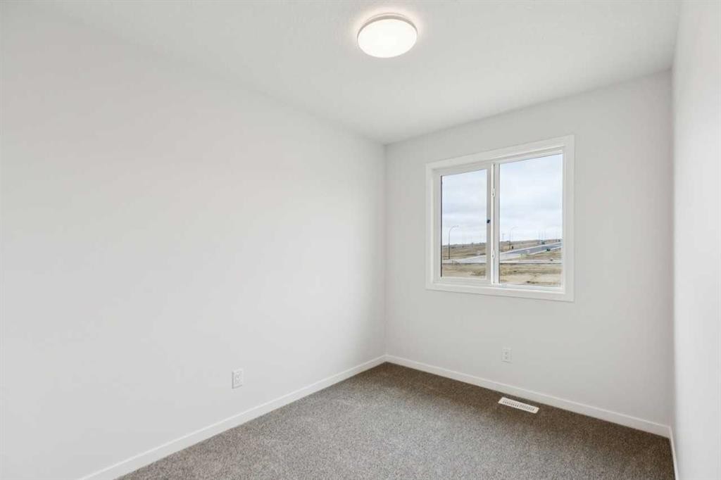 65 Aquila Terrace Nw, Calgary, AB - Indoor Photo Showing Other Room