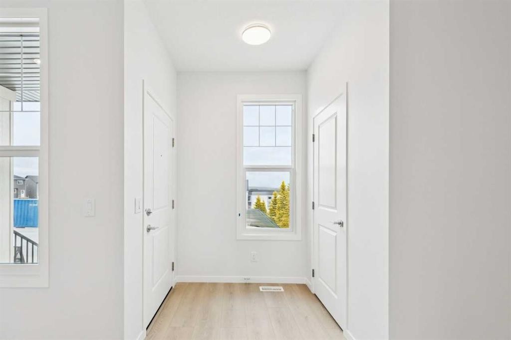 65 Aquila Terrace Nw, Calgary, AB - Indoor Photo Showing Other Room