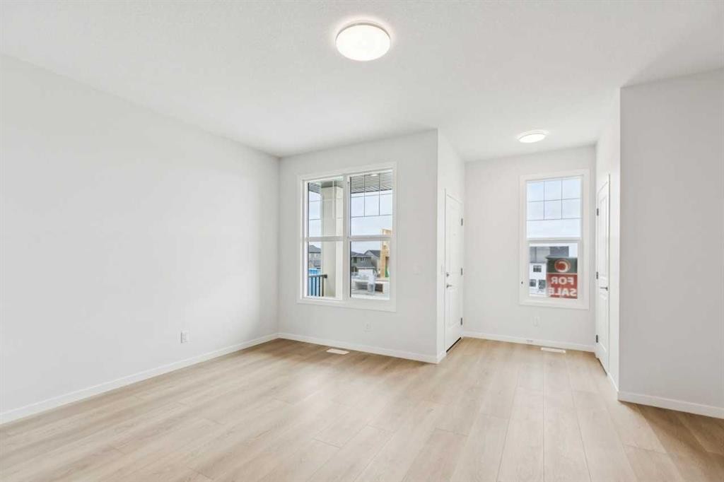 65 Aquila Terrace Nw, Calgary, AB - Indoor Photo Showing Other Room