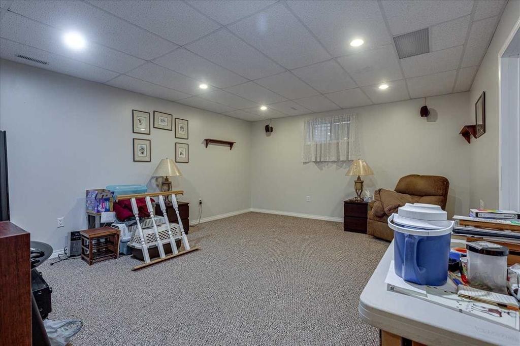 11 West Heights Drive, Didsbury, AB - Indoor Photo Showing Basement