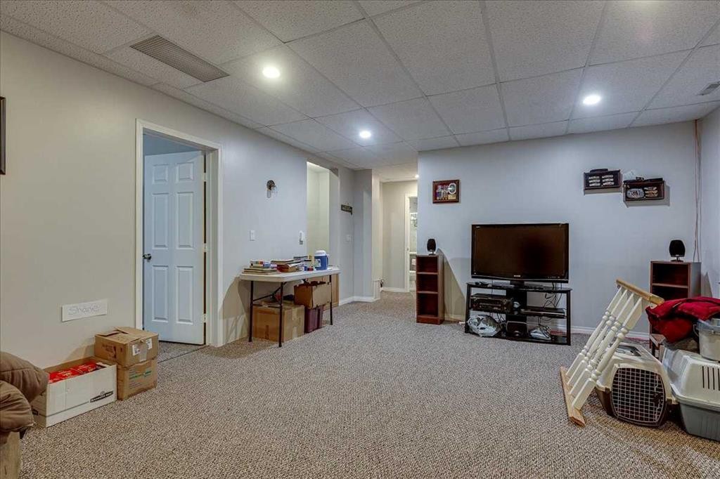 11 West Heights Drive, Didsbury, AB - Indoor Photo Showing Basement