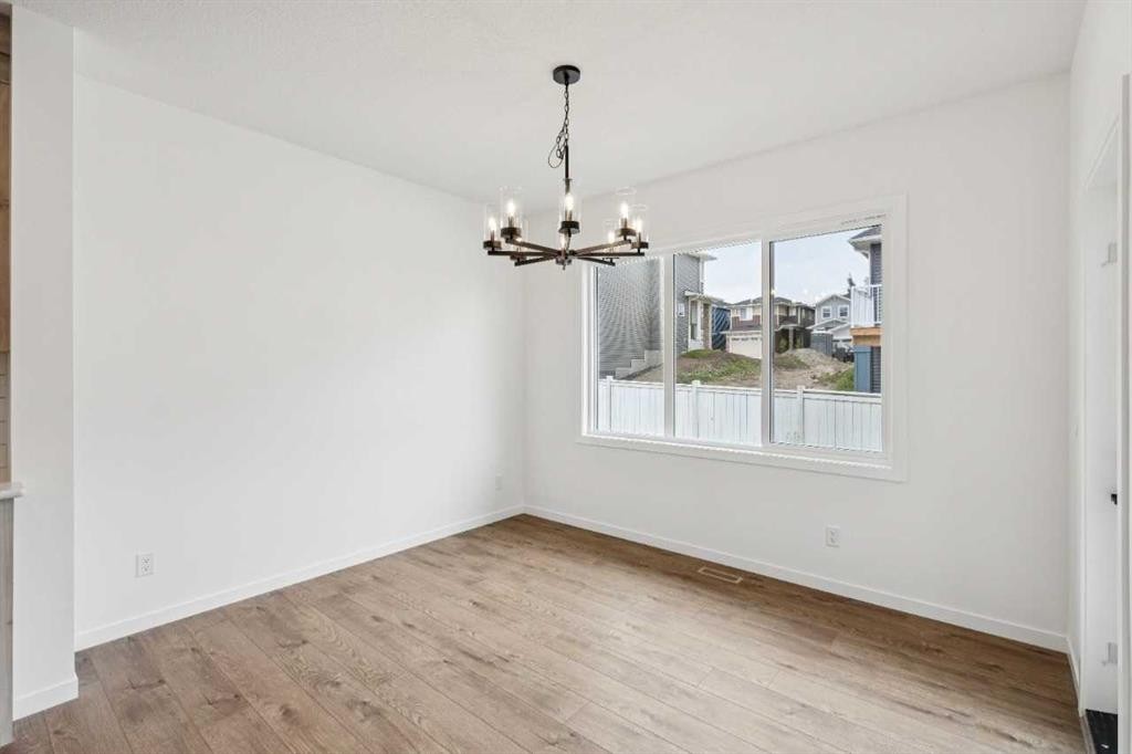 1030 Bayview Crescent Sw, Airdrie, AB - Indoor Photo Showing Other Room